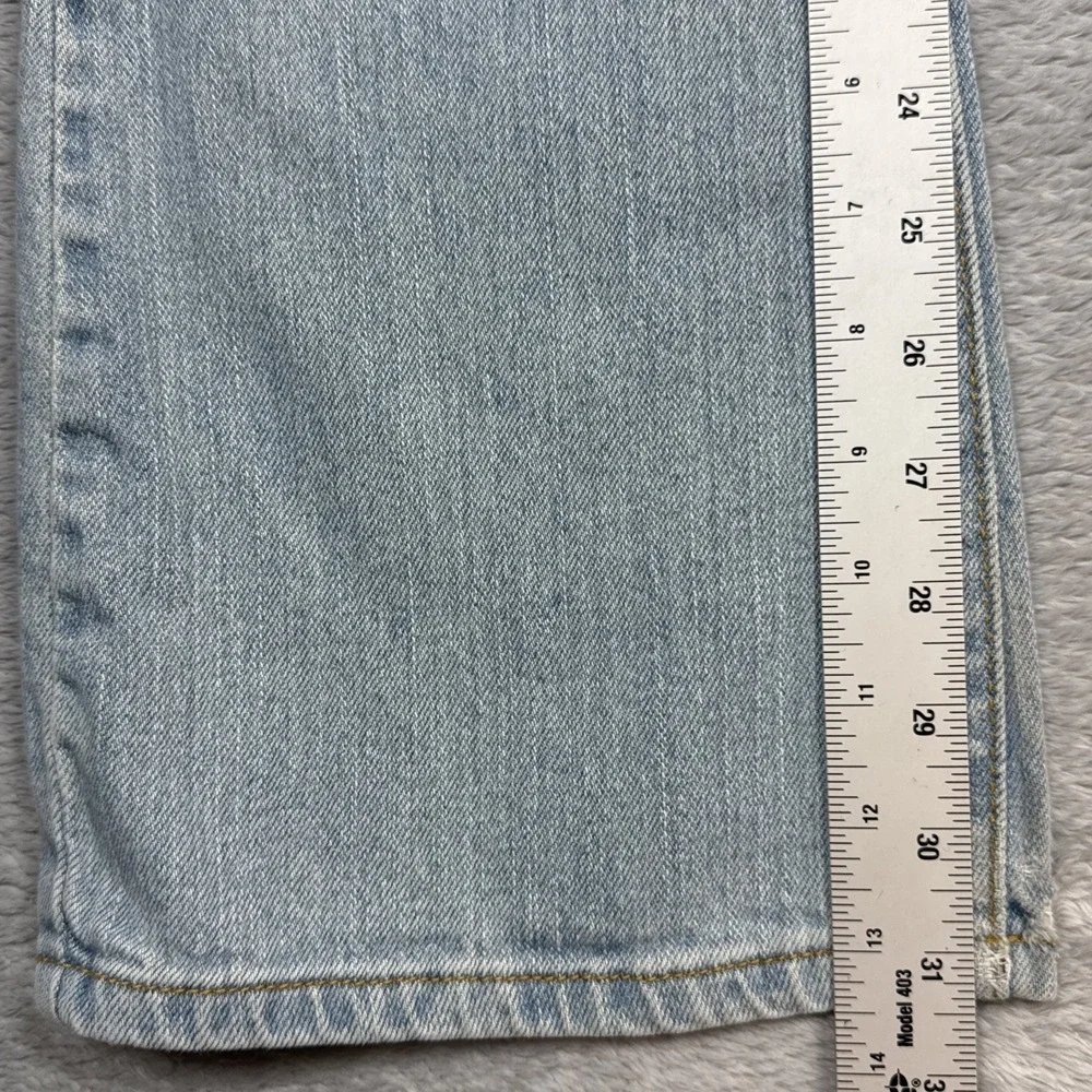 Vintage Levi's 518 Superlow Bootcut Jeans 31x31 Blue Light Wash Low Rise Stained